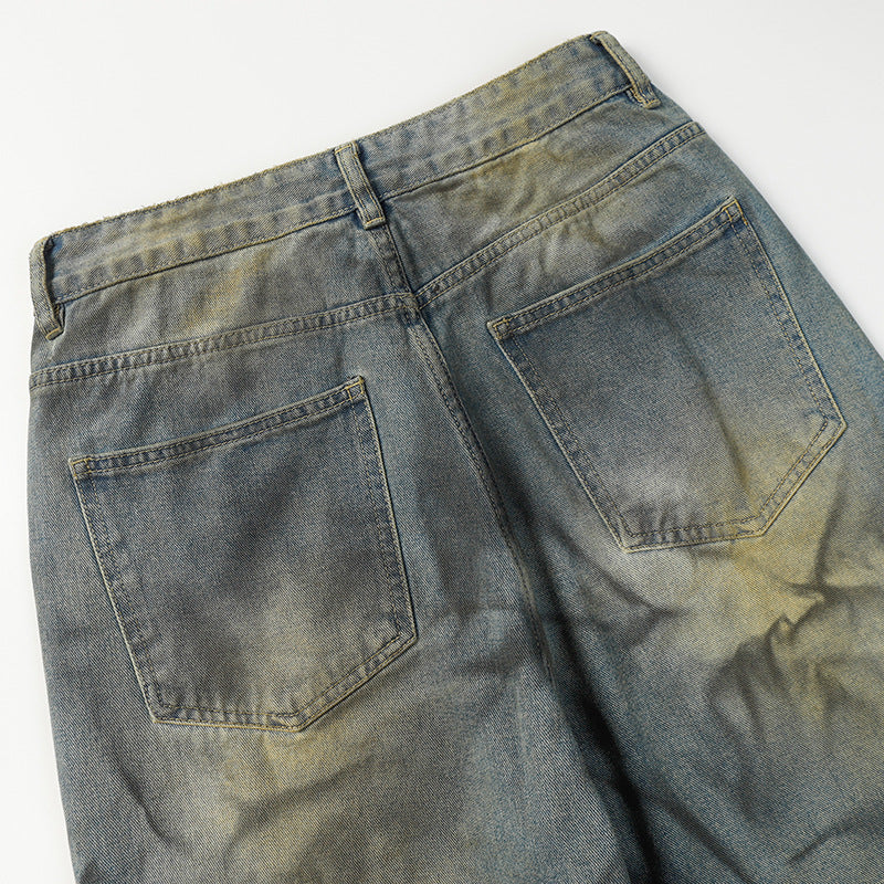 Washed And Worn Denim Trousers