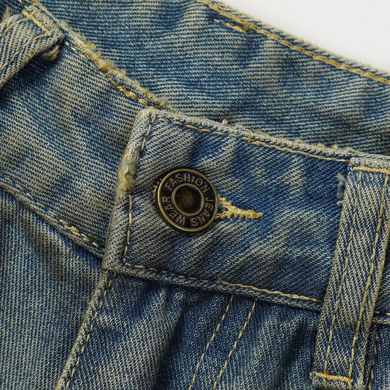 Washed And Worn Denim Trousers